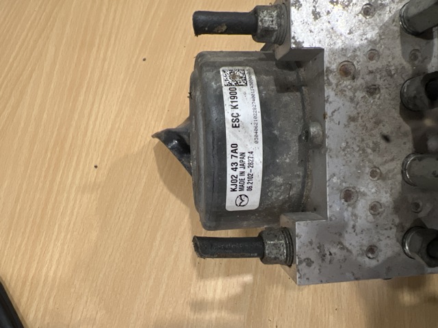 Блок ABS гидравлический KJ02437A0 MAZDA