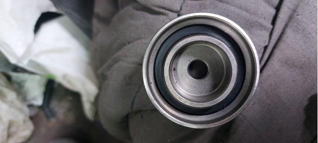 Ролик натяжителя ремня газораспределения Mazda 323 3