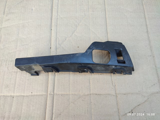 Кронштейн бампера переднего, правый 4M5117E856AC FORD