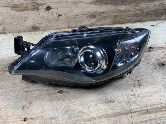 Основная фара в сборе левая 84001FG311 SUBARU