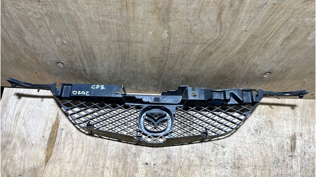 MAZDA C10050712 Решетка радиатора в наличии Тернополь