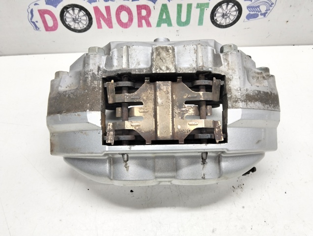 41011JL02A NISSAN Суппорт тормозной передний левый купить в Черновцы