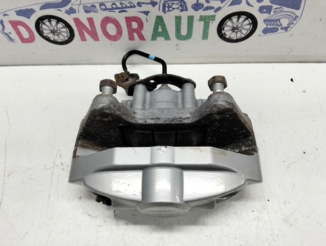 Суппорт тормозной левый задний 44011JL02A NISSAN