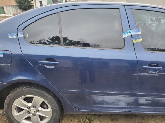 Дверь пассажирская задняя правая Skoda Octavia 2 A5