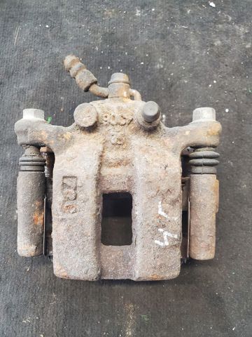 Суппорт тормозной левый задний 44011CB10A NISSAN