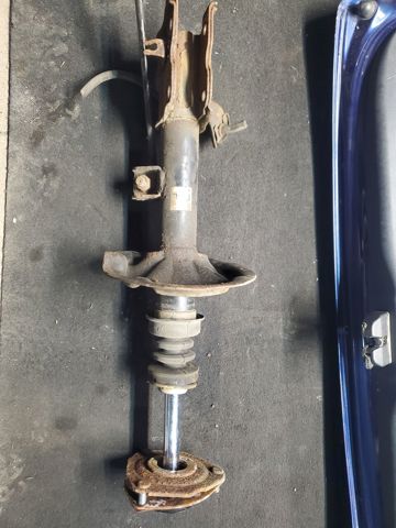 Стойка передняя левая 54303CB025 NISSAN