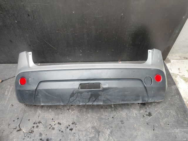 Задний бампер 85022JD00H NISSAN