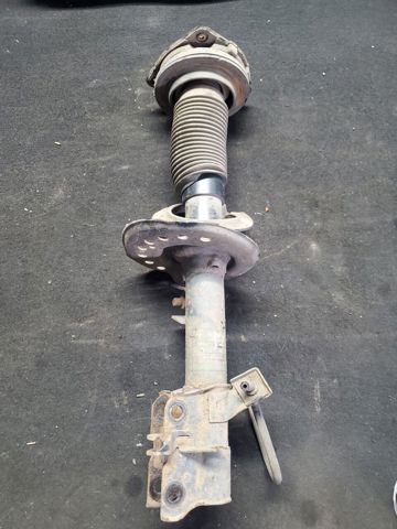 Передний правый амортизатор E4302JD01A NISSAN