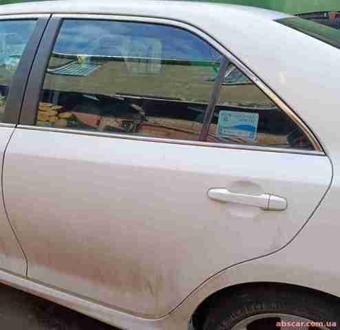 Стекло заднее левое 6810406170 TOYOTA