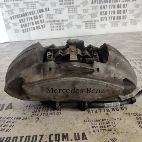 Суппорт тормозной передний левый A0114219798 MERCEDES