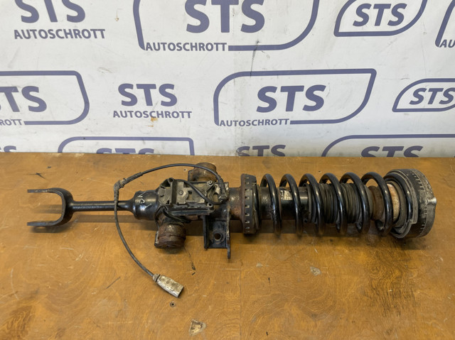 Амортизатор передней подвески правый 37114064272 BMW