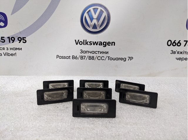 Фонарь подсветки заднего номера 8T0943021 VAG