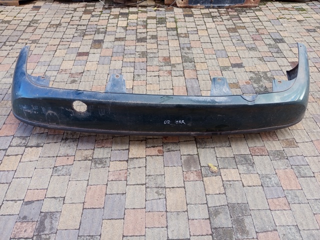 Бампер задний 1404147 OPEL