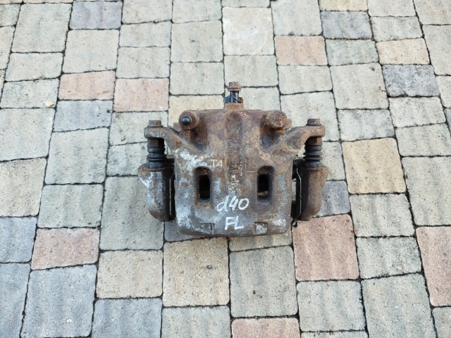 Суппорт тормозной передний левый 41011EB32A NISSAN