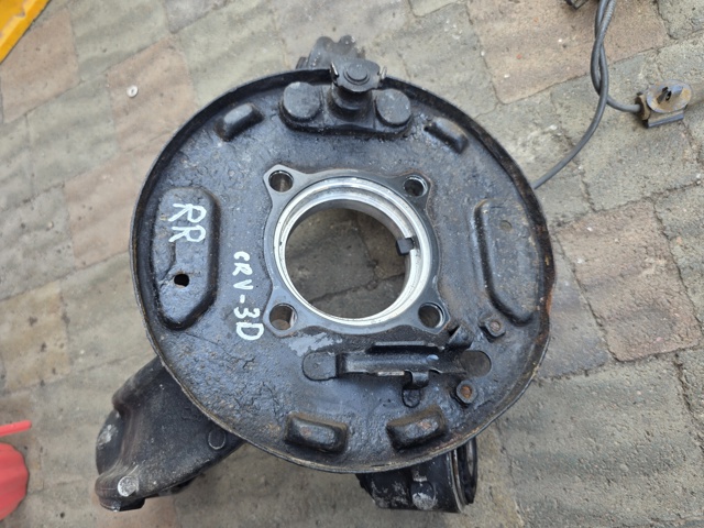 Пыльник тормозного диска заднего правый 43110SWW003 HONDA