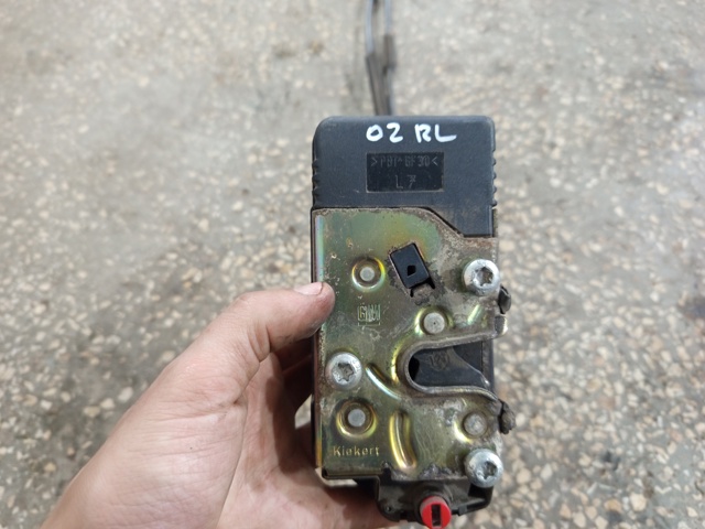 Замок двери задней левой 5134137 OPEL