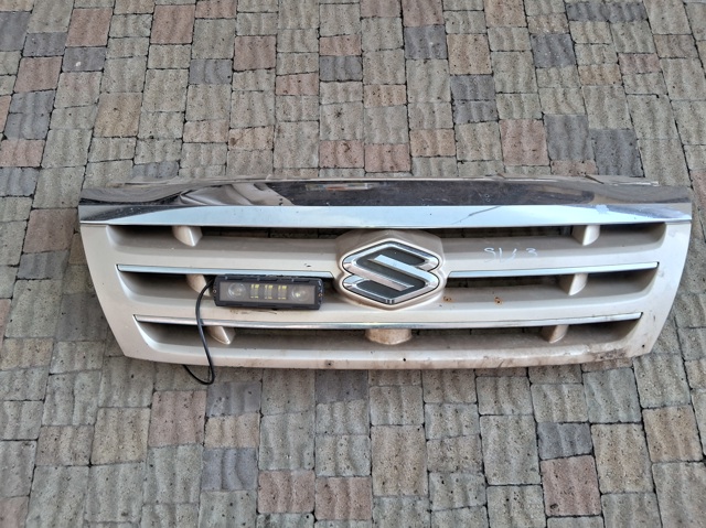 Облицовка радиатора 7211152D00 SUZUKI