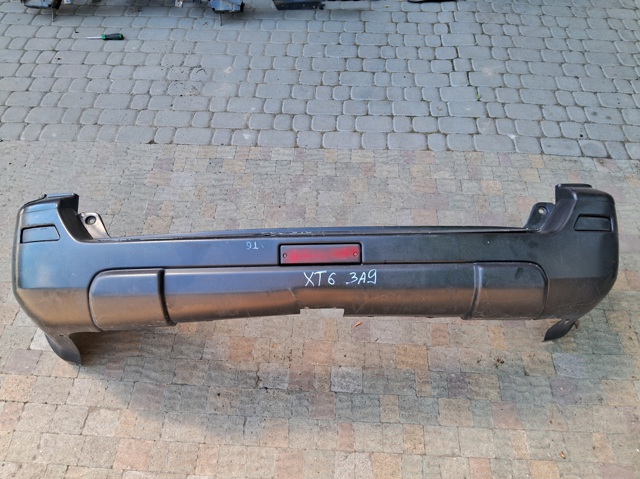 Бампер задний 850228H326 NISSAN
