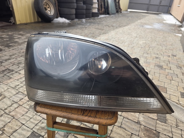 Вставка фары правой 921023E010 HYUNDAI