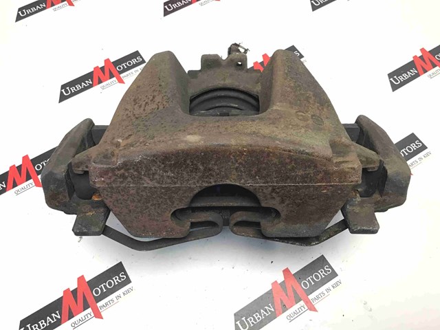 Суппорт тормозной, передний, левый LR090691 LAND ROVER