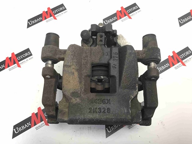 Тормозной суппорт задний левый LR113712 LAND ROVER