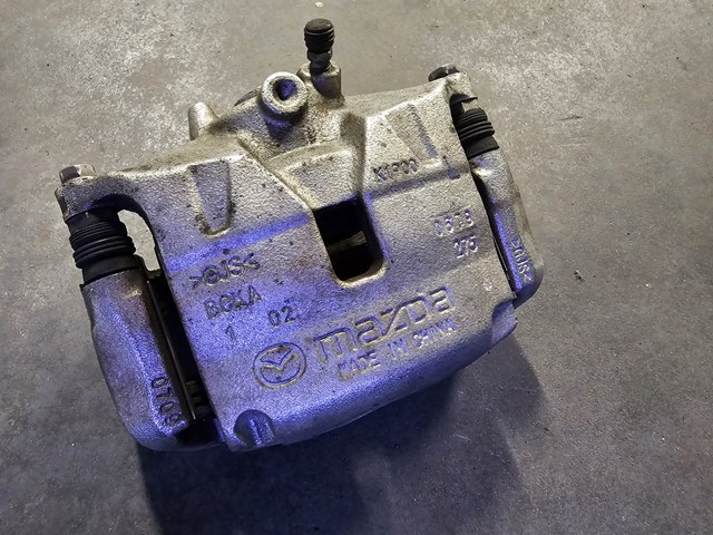 Суппорт тормозной передний левый BCYA3399ZB MAZDA