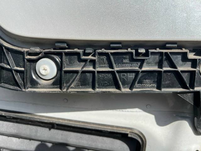 Кронштейн бампера заднего, внешний правый 149403700A TESLA