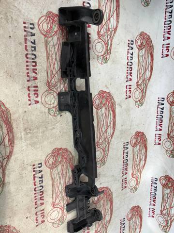 Кронштейн радиатора нижний 215424EB0A NISSAN