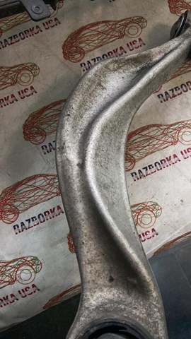 Передний нижний рычаг 31126777734 BMW