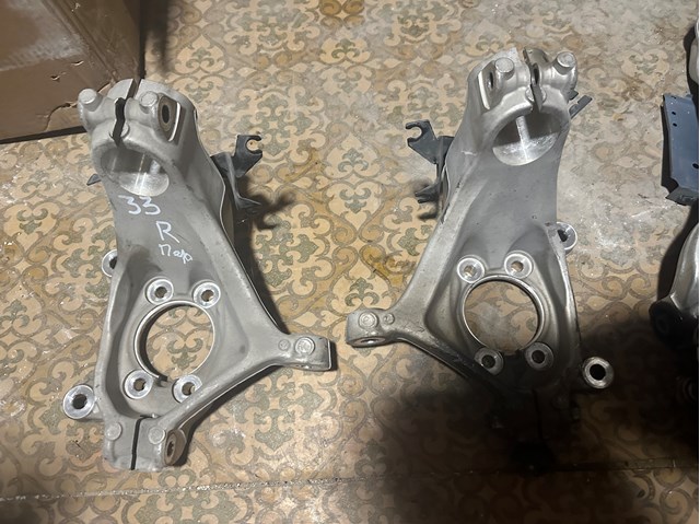 Цапфа поворотного кулака 400146RA0A NISSAN