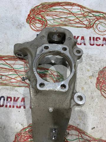 Кулак поворотный передний левый 400154GA0A NISSAN