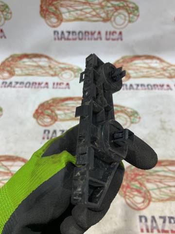 Кронштейн бампера заднего, левый 852254GA0A NISSAN
