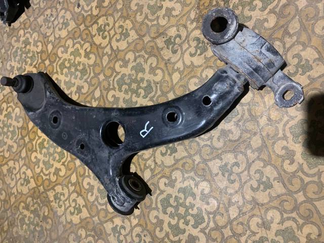 Передний нижний рычаг B60S34300G MAZDA