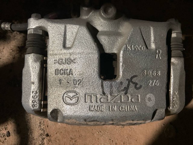 Суппорт тормозной передний правый BCYA3398ZB MAZDA
