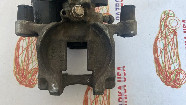 Задний правый суппорт DG9Z2552C FORD