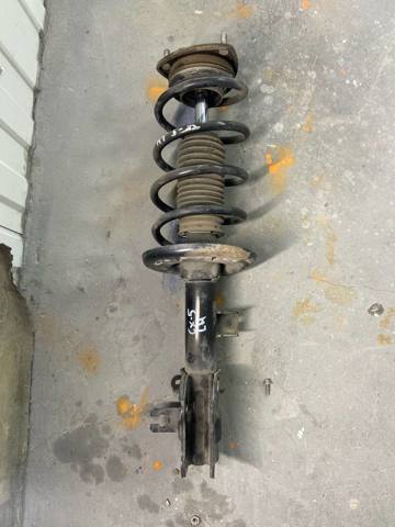 Стойка передняя левая KD3534900A MAZDA