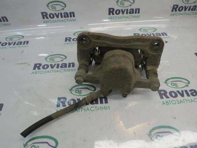 582302P700 HYUNDAI Суппорт задний правый купить в Сумы