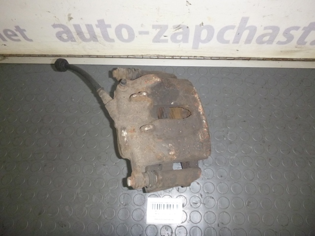 Суппорт тормозной, передний, левый 7701202038 RENAULT
