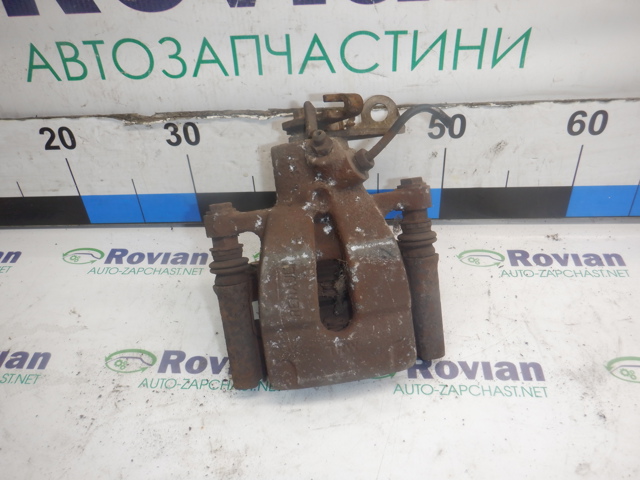 Задний правый суппорт 7701208257 RENAULT