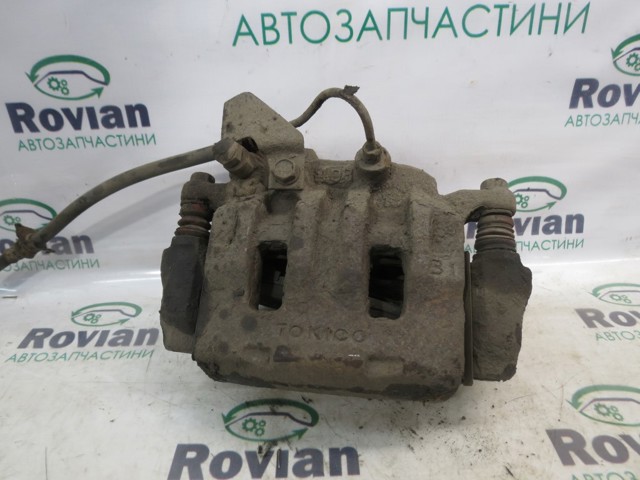 Суппорт тормозной передний левый MR977362 MITSUBISHI