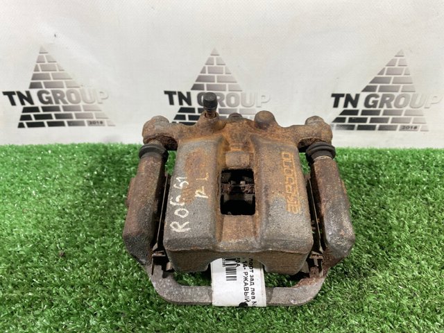 Суппорт тормозной левый задний 440113NF0A NISSAN