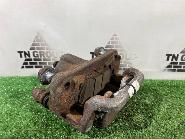 NISSAN 440113NF0A Суппорт задний левый в наличии Чернигов