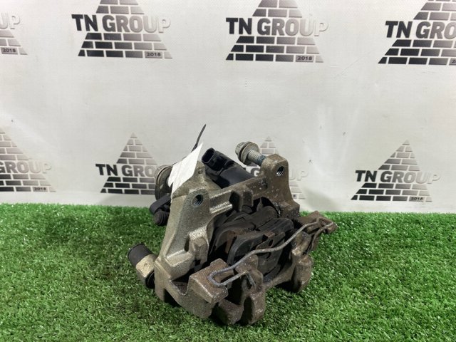 Тормозной суппорт правый задний DG9Z2552B FORD