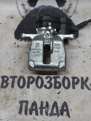 Суппорт тормозной левый задний 8K0615403B VAG