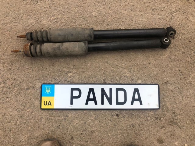 Стойка амортизатора задняя E62109MB0A NISSAN