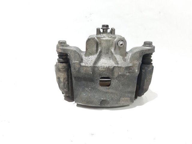 Суппорт тормозной, передний, левый 410113TA0C NISSAN