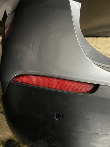 Левый отражатель заднего бампера 63142990863 BMW