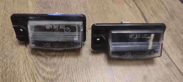 Фонарь подсветки заднего номера 265108991D NISSAN