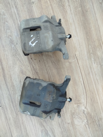 Суппорт тормозной, передний, левый 410114EA0A NISSAN