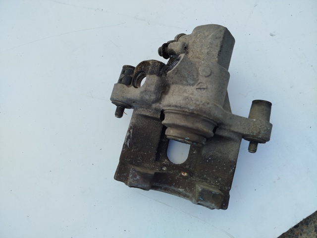Суппорт тормозной задний правый 8M5Z2552B FORD
